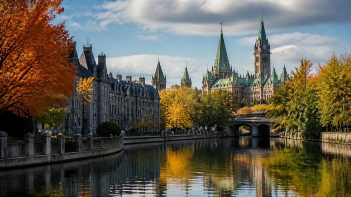 The Rideau Canal in autumn with Parliament's towers in the background